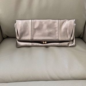 Women’s metallic clutch.